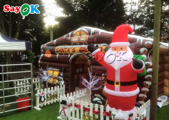 Çocuk Noel Noel'i şişme sıçrama evinde